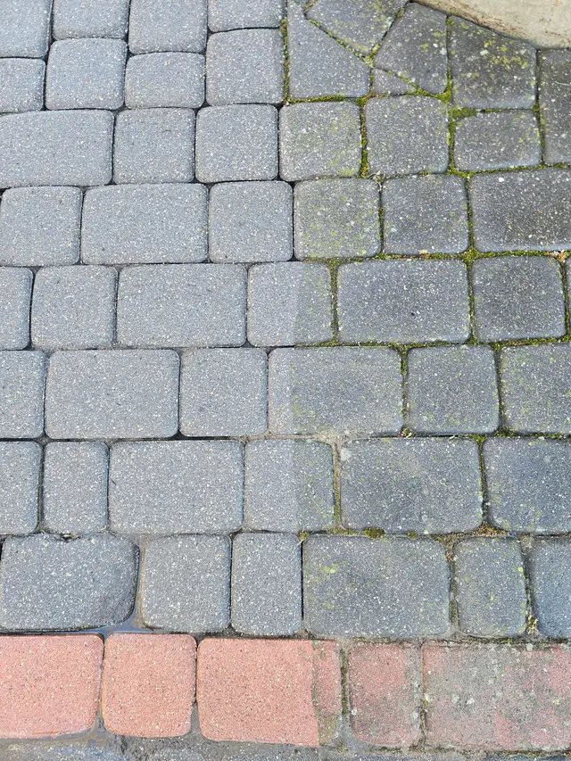 Zabrudzone fugi kostki brukowej przed myciem